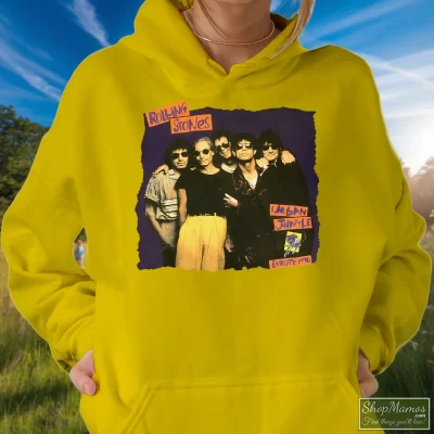 Women's 1990 Rolling Stones Urban Jungle Tour Hoodie In Yellow, Front View On Dark Wood Background