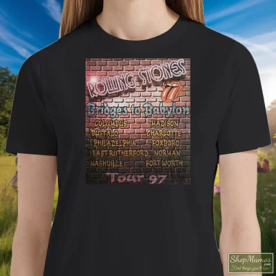 Women's 1997 The Rolling Stones Bridges To Babylon Tour T Shirt In Black, Front View On Light Wood Background