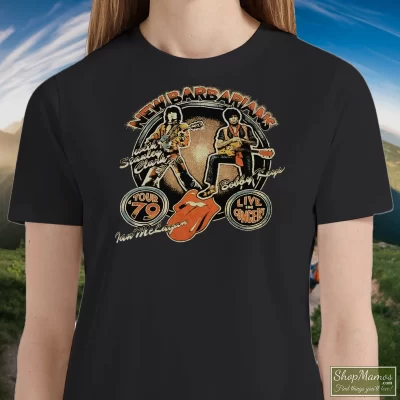 Women's 70s 1979 New Barbarians Concert Tour Rolling Stones Rock T Shirt In Black, Front View On Light Wood Background