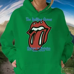 90s 1997 Rolling Stones Rock Tour Bridges To Babylon Shirt 9 Women's 90s 1997 Rolling Stones Rock Tour Bridges To Babylon Hoodie In Irish Green, Front View On Light Wood Background