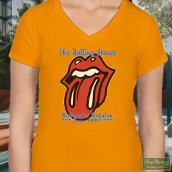 90s 1997 Rolling Stones Rock Tour Bridges To Babylon Shirt 6 Women's 90s 1997 Rolling Stones Rock Tour Bridges To Babylon V Neck In Orange, Front View On Dark Wood Background