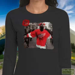 90s Tupac Shakur 2pac Wearing Detroit Red Wing Jersey Hip Hop Rap Hype Dope Swag Shirt 9 Women's 90s Tupac Shakur 2pac Wearing Detroit Red Wing Jersey Hip Hop Rap Hype Dope Swag Long Sleeve In Black, Front View On Light Wood Background