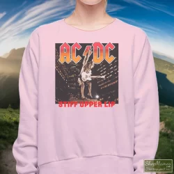 ACDC Band Tees 2000 ACDC Stiff Upper Lip Tour Tee Shirt 5 Women's Acdc Band Tees 2000 Acdc Stiff Upper Lip Tour Sweatshirt In Light Pink, Front View On Dark Wood Background