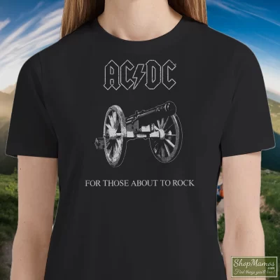 Women's Acdc For Those About To Rock Band Logo Distressed T Shirt In Black, Front View On Light Wood Background