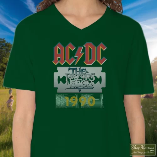Acdc The Razors Edge Tour 1990 Women’s V Neck – Forest Green Front View On Light Wood Background Women's Acdc The Razors Edge Tour 1990 V Neck In Forest Green, Front View On Light Wood Background
