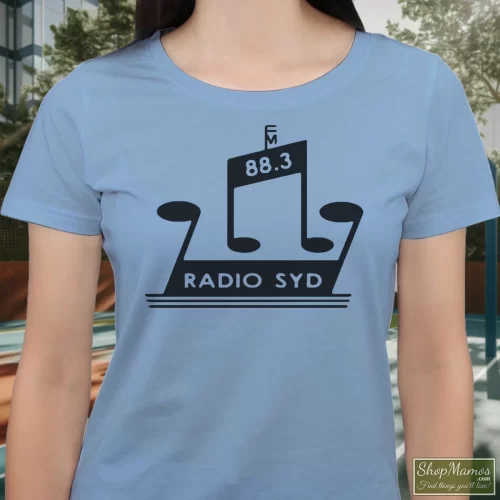 Brian Jones Radio Syd Rolling Stones Women’s T Shirt – Light Blue Front View On Dark Wood Background Women's Brian Jones Radio Syd Rolling Stones T Shirt In Light Blue, Front View On Dark Wood Background