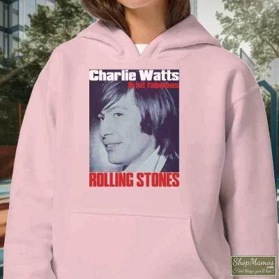 Women's Charlie Watts Rolling Stones Drummer 90s Promotion Hoodie In Light Pink, Front View On Dark Wood Background