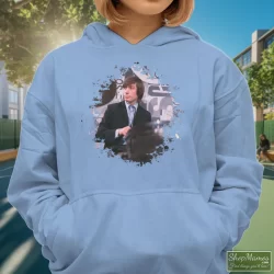 Charlie Watts Rolling Stones Shirt 7 Women's Charlie Watts Rolling Stones Hoodie In Light Blue, Front View On Dark Wood Background