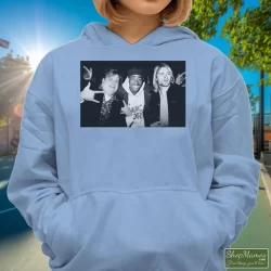 Chris Farley Tupac Shakur And Kurt Cobain Partying Shirt 90s Streetwear Hip Hop Er 2pac 6 Women's Chris Farley Tupac Shakur And Kurt Cobain Partying 90s Streetwear Hip Hop Er 2pac Hoodie In Light Blue, Front View On Dark Wood Background