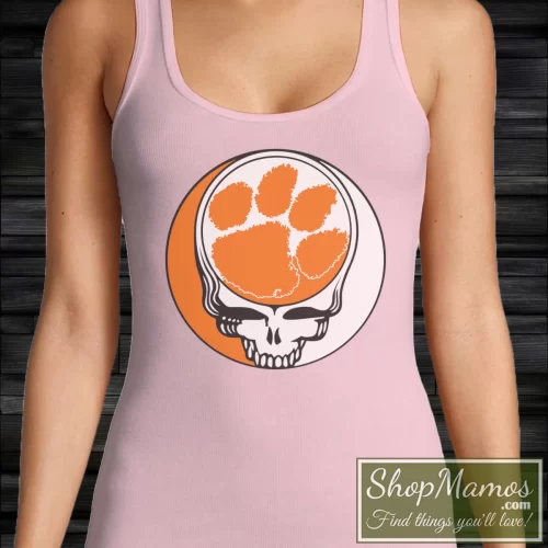 Clemson Tigerpaw Football Grateful Dead Steal Your Face Women’s Tank Top – Light Pink Front View On Dark Wood Background Women's Clemson Tigerpaw Football Grateful Dead Steal Your Face Tank Top In Light Pink, Front View On Dark Wood Background