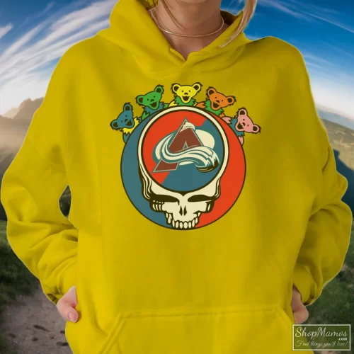 Colorado Avalanche Grateful Dead Steal Your Face Hockey NHL Women’s Hoodie – Yellow Front View On Dark Wood Background Women's Colorado Avalanche Grateful Dead Steal Your Face Hockey NHL Hoodie In Yellow, Front View On Dark Wood Background