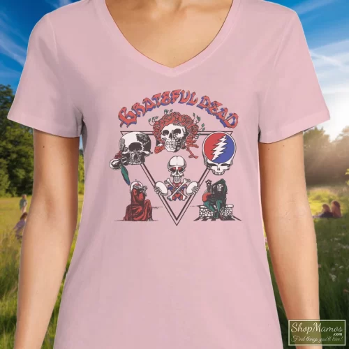 Grateful Dead Jerry Garcia 1978 Tour Women’s V Neck – Light Pink Front View On Dark Wood Background Women's Grateful Dead Jerry Garcia 1978 Tour V Neck In Light Pink, Front View On Dark Wood Background