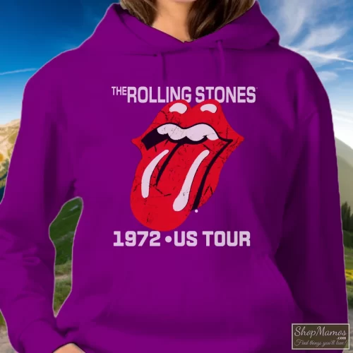 The Rolling Stones 1972 US Tour Women’s Hoodie – Purple Front View On Light Wood Background Women's The Rolling Stones 1972 US Tour Hoodie In Purple, Front View On Light Wood Background