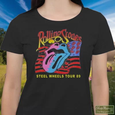 Women's The Rolling Stones Steel Wheels Tour 89 T Shirt In Black, Front View On Light Wood Background