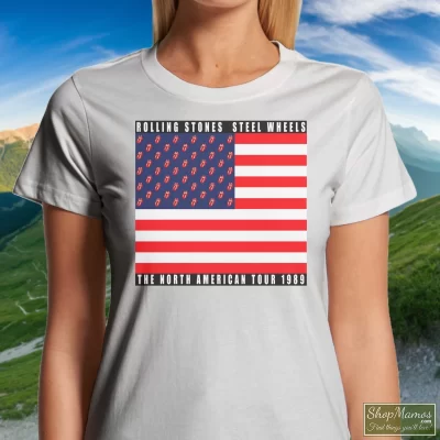 Women's The Rolling Stones Usa Flag Steel Wheels The North American Tour 1989 T Shirt In White, Front View On Dark Wood Background