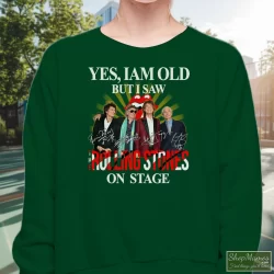 I Am Old But I Saw Rolling Stones On Stage Shirt 2 Women's I Am Old But I Saw Rolling Stones On Stage Sweatshirt In Forest Green, Front View On Light Wood Background
