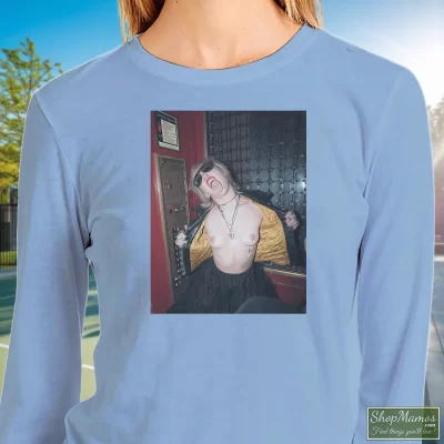 Women's Miley Cyrus Rolling Stones Magazine Plastic Hearts Rock Sweatshirt In Light Blue, Front View On Dark Wood Background