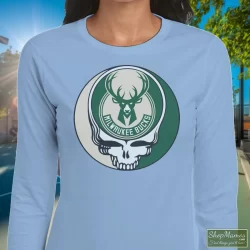 Milwaukee Bucks Basketball Grateful Dead Steal Your Face T-Shirt 1 Women's Milwaukee Bucks Basketball Grateful Dead Steal Your Face Long Sleeve In Light Blue, Front View On Dark Wood Background