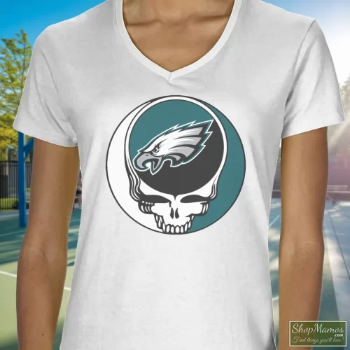 Philadelphia Eagles Grateful Dead Steal Your Face Women’s V Neck – White Front View On Dark Wood Background Women's Philadelphia Eagles Grateful Dead Steal Your Face V Neck In White, Front View On Dark Wood Background