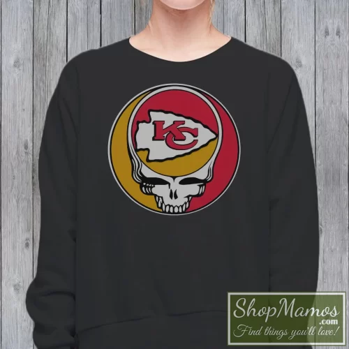 Rare NFL Team Kansas City Chiefs X Grateful Dead Logo Band Women’s Sweatshirt – Black Front View On Light Wood Background Women's Rare NFL Team Kansas City Chiefs X Grateful Dead Logo Band Sweatshirt In Black, Front View On Light Wood Background