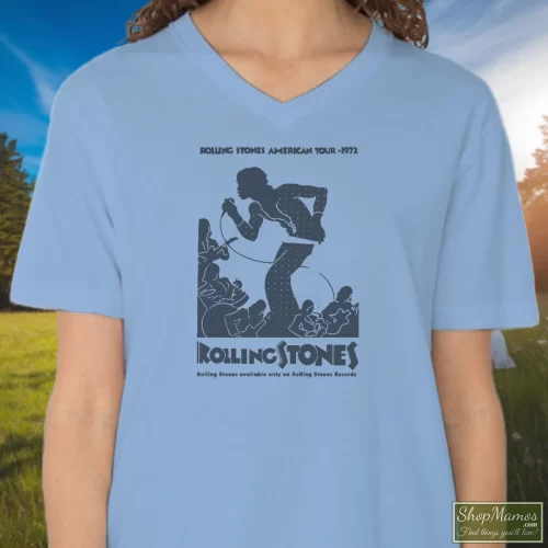 Rolling Stones 1972 American Tour Women’s V Neck – Light Blue Front View On Dark Wood Background Women's Rolling Stones 1972 American Tour V Neck In Light Blue, Front View On Dark Wood Background