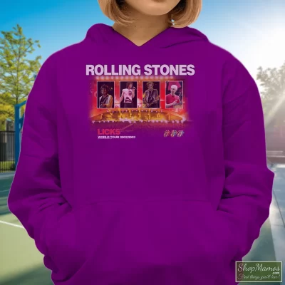 Women's Rolling Stones Licks World Tour Hoodie In Purple, Front View On Light Wood Background