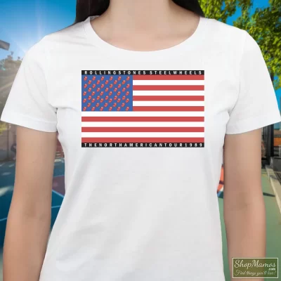 Women's Rolling Stones Steel Wheels 1989 Tour T Shirt In White, Front View On Dark Wood Background