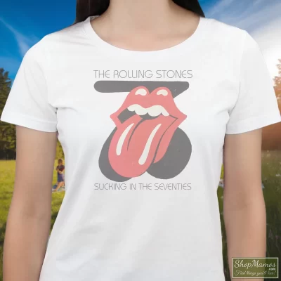 Women's Rolling Stones Sucking In The Seventies White T Shirt In White, Front View On Dark Wood Background