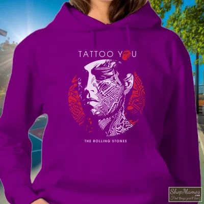Women's Rolling Stones Tattoo You Album Hoodie In Purple, Front View On Light Wood Background