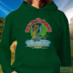 Rolling Stones Tour 1981 Dragon Shirt 2 Women's Rolling Stones Tour 1981 Dragon Hoodie In Forest Green, Front View On Light Wood Background