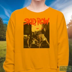 Skid Row 1991 Slave To The Grind Tour Shirt 4 Women's Skid Row 1991 Slave To The Grind Tour Sweatshirt In Orange, Front View On Dark Wood Background