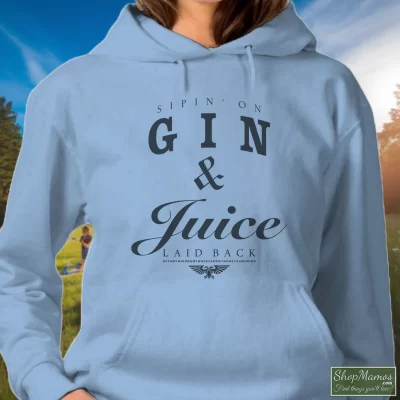 Women's Snoop Dogg Gin And Juice Hoodie In Light Blue, Front View On Dark Wood Background