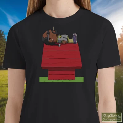 Women's Snoop Dogg Snoopy T Shirt In Black, Front View On Light Wood Background