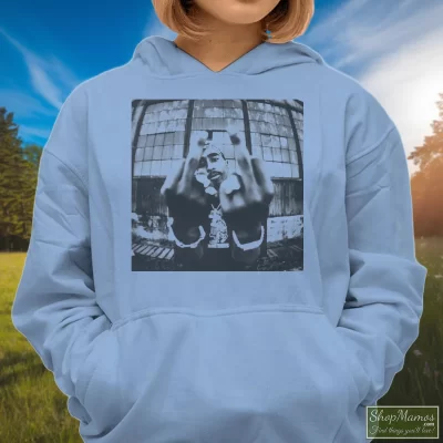 Women's Tupac Shakur 2pac Middle Finger Photo Hoodie In Light Blue, Front View On Dark Wood Background