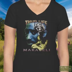 Tupac Shakur 2pac Thug Life One Year In Memory Memorial Shirt 8 Women's Tupac Shakur 2pac Thug Life One Year In Memory Memorial V Neck In Black, Front View On Light Wood Background
