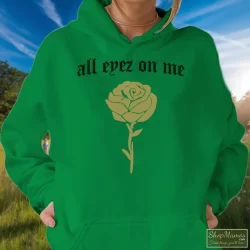 Tupac Shakur All Eyez On Me New Era Shirt 8 Women's Tupac Shakur All Eyez On Me New Era Hoodie In Irish Green, Front View On Light Wood Background