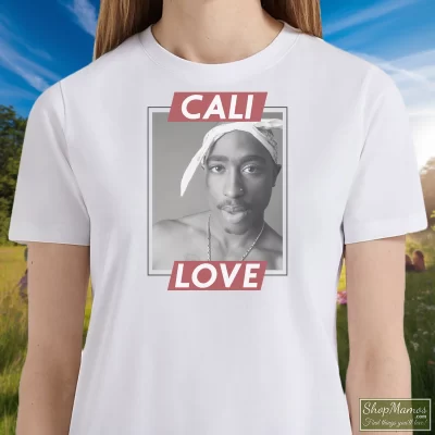 Women's Tupac Shakur Rapper Cali Love T Shirt In White, Front View On Dark Wood Background