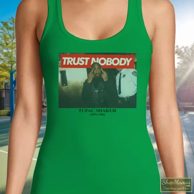 Women's Tupac Shakur Trust Nobody Tank Top In Irish Green, Front View On Light Wood Background