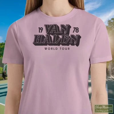 Women's Van Halen 1978 World Tour T Shirt In Light Pink, Front View On Dark Wood Background
