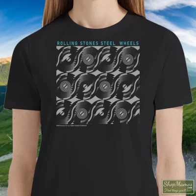 Women's Vintage 1989 ROLLING STONES Steel Wheels Tour T Shirt In Black, Front View On Light Wood Background