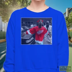 World Star Hiphop Tupac Shakur 2pac Detroit Spitting Hip Hop Rap Shirt 5 Women's World Star Hiphop Tupac Shakur 2pac Detroit Spitting Hip Hop Rap Sweatshirt In Royal Blue, Front View On Light Wood Background