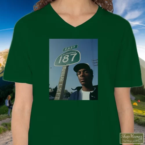 Young Snoop Dogg California 187 Women’s V Neck – Forest Green Front View On Light Wood Background Women's Young Snoop Dogg California 187 V Neck In Forest Green, Front View On Light Wood Background